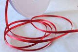 berisfords 3mm satin ribbon. Poppy red, colour 21. Sold by the metre with full roll quantity discounts.