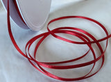 berisfords 3mm satin ribbon. red colour 15. sold per metre, 30 metre rolls and 100 metre spools.