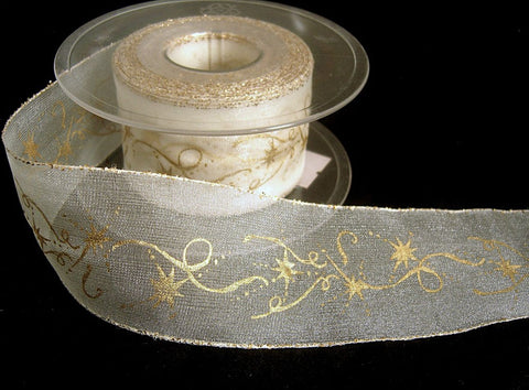 40mm green organza ribbon with metallic borders and Christmas spiral print.