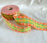 40mm orange and green gingham ribbon with satin jacquard daisy border.