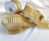 Gold mesh ribbon with a metallic lurex and old gold brown banded centre. 40mm wide, double face and wire edge. Buy online per metre Ribbonmoon ribbons UK online shop.