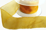 40mm topaz gold sparkle organza sheer ribbon with metallic tinsel borders.