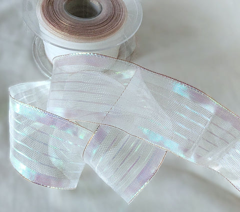 40mm white and iridescent metallic mesh and stripe ribbon with wire edge, shimmering mother‑of‑pearl lurex, ideal for gift wrapping, floral arrangements and decorative crafts.