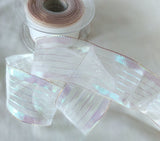 40mm metallic iridescent stripe‑sheer ribbon with wired edges, showing hologram shimmer and mesh panels