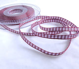 Berisfords 5mm burgundy and white traditional polyester gingham ribbon.