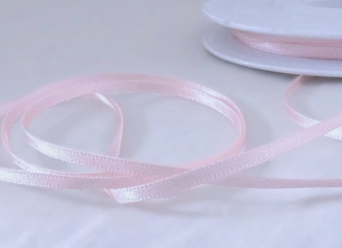 3mm width pale pink satin ribbon. Berisfords Ribbons, colour 70, sold online by the metre. Ribbonmoon Crafting Supplies UK