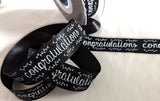 Black 25mm satin ribbon with printed 'Congratulations' text 