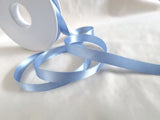 10mm width satin ribbon by Berisfords Ribbons in the UK.  Sold by the metre with discounts for longer lengths and full rolls. Dusky blue colour 61.