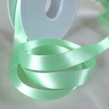 15mm wide mint green double face satin ribbon by berisfords ribbons uk. colour 56. Buy online by the metre or full rolls. Ribbonmoon haberdashery