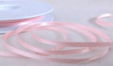 width pink azalea colour 400 double face luxury satin ribbon manufactured by Berisfords Ribbons in the UK.