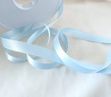 Berisfords sky blue satin ribbon. 7mm width, double face, polyester. Buy by the metre and cut to the length you require. Ribbonmoon ribbons online shop
