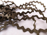 Vintage drab brown ric rac braid crafted from soft, natural cotton.