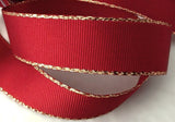 Berisfords 1-inch wide grosgrain ribbon in Scarlet Berry red, accented with elegant gold metallic borders.