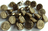 11mm metallic effect shank button. Antique brass with a textured pattern