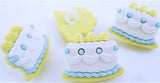21mm Sky Blue, White & Primrose Cake shaped Novelty Shank Button