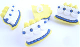 Royal Blue, White and Primrose Yellow
Cake Design Novelty Nylon Shank Button