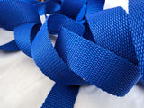 1"-inch width royal blue webbing strapping tape. Sold by the metre online with shop longer length discounts at Ribbonmoon crafting supplies.