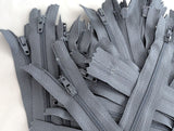 18cm closed end zips, slate grey polyester fabric and nylon no.3 teeth
