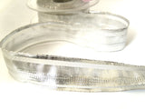 R0138 25mm Metallic Silver Lurex Ribbon with Sheer Stripes. Wire Edge