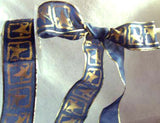 R0540 40mm Translucent Navy Ribbon with a Metallic Gold Print and Edges - Ribbonmoon