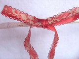 R1709 11mm Ivory Lace over a Raspberry Pink Acetate Ribbon