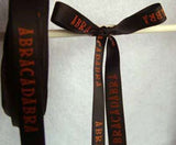 R1768 13mm Black Satin with an Orange ABERACADABERA Print - Ribbonmoon