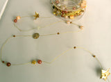 R1773 Gold Wire Decorated with Shell Buttons, Stars and Beads