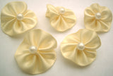 RB077 Cream Satin Rosette Bow with a Pearl Centre by Berisfords - Ribbonmoon