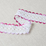 L525 35mm White and Mixed Hot Pinks Eyelet or Knitting In Flat Lace